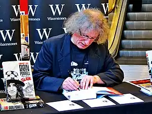 Powell signing copies of his biography Look Wot I Dun - My Life in Slade at Liverpool One's Waterstones in 2014