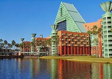 Quotations (uses of elements and ornaments taken from pre-Modernist styles, often highly simplified) – Dolphin Hotel, Orlando, Florida, US, with urn tops that are reminiscent of urns that decorate corners, tops and roof railings of Classical buildings and furniture, by Michael Graves (1989)