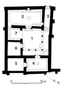 Restored plan of the first synagogue. 1. Central courtyard2. Community assembly hall3. Corridor4. Reception hall 5. Reception hall6. Residential room7. Auxiliary room to the assembly hallPlan based on notes by Henry Pearson (circa 1936) as mentioned in Hopkins 1979.