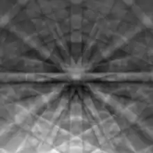 An electron backscatter diffraction pattern of monocrystalline silicon, taken at 20 kV with a field-emission electron source. The Kikuchi bands intersect at the centre of the image