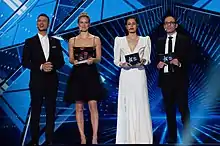 2019 hosts: Assi Azar, Bar Refaeli, Lucy Ayoub and Erez Tal