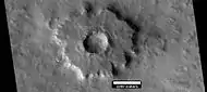 Pedestal crater, as seen by HiRISE under HiWish program.  Top layer has protected the lower material from being eroded.