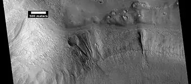 Gullies on wall of mesa, as seen by HiRISE under HiWish program