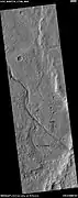 Channel showing an old oxbow and a cutoff, as seen by HiRISE under HiWish program