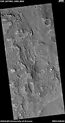 Wide view of layered features, as seen by HiRISE under HiWish program