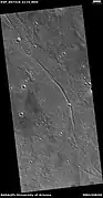 Possible dike, as seen by HiRISE under HiWish program.  Here magma probably moved along a fault line underground.  Later erosion removed all but the hardened magma.