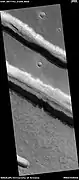 Troughs, as seen by HiRISE under HiWish program.  Layers are also visible in the image.