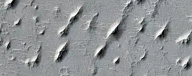 Close view of yardangs. These features are shaped by the wind.