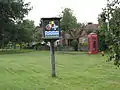 Red telephone box in Earls Colne along High Street