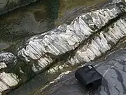 Calcite slickenfibres on the surface of a normal fault, east of Kilve, Somerset.