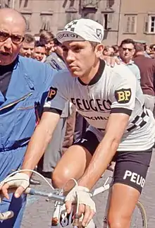 Eddy Merckx on a bike wearing the Peugeot team kit