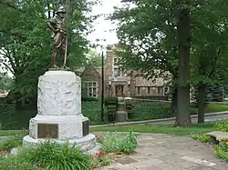 Edgewood's municipal building with its World War I memorial in the foreground