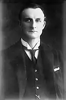 Monochrome photograph of Edward Gray in wing collar