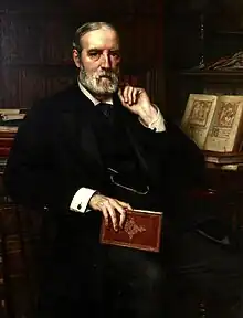 Seated painted portrait of John Clay, holding a book and with a manuscript open on a table to his right