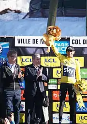 Egan Bernal, wearing the yellow jersey of the race leader