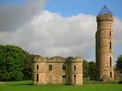 A clear view of the tower and the remaining side wall