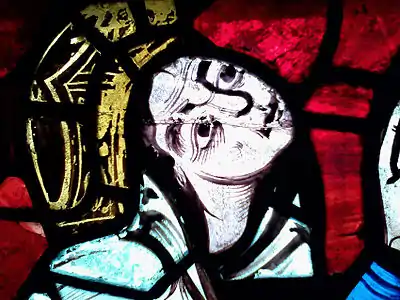 Stained glass window at Poitiers Cathedral allegedly portraying Eleanor in a crucifixion scene