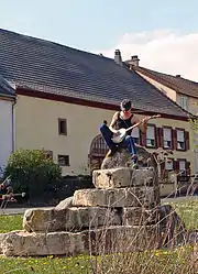 A banjo player in Ellviller