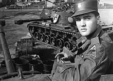 Elvis Presley poses for the camera during his military service at a US base in Germany.