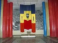 "Empty" Romanian flags with the communist insignia cut out, on the model of the Hungarian flags, pierced in the Revolution of 1956., from an exhibit at the Military Museum, Bucharest