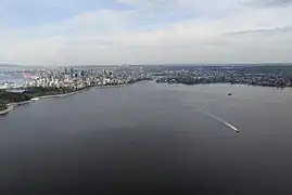 Aerial photo of English Bay looking east, including downtown, the West End, and Kitsilano