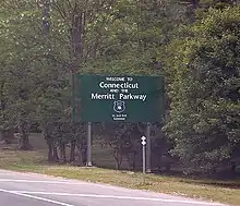 A sign stating "Welcome to Connecticut and the Merritt Parkway"