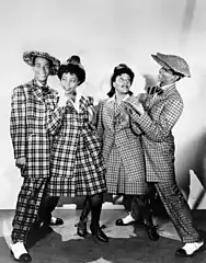 Entertainers wearing zoot suits for Hit Parade of 1943