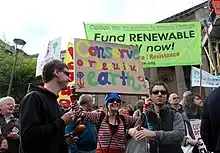 People in Melbourne celebrate World Environment Day 2011 with a rally to fund renewable energy.