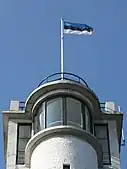 Flag of Estonia on top of Suur Munamagi observation tower, the highest point in Estonia, at 318m above sea level.