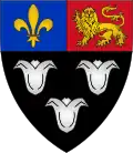 Arms of Eton College: Sable, three lily-flowers argent on a chief per pale azure and gules in the dexter a fleur-de-lys in the sinister a lion passant guardant.