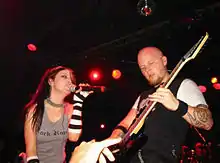 Amy Lee and Ben Moody onstage