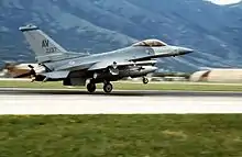 An F-16C Fighting Falcon of the 31st Fighter Wing landing upon returning from an air-strike against the Bosnian Serbs during Operation Deliberate Force in 1995