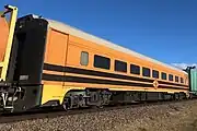 Crew car FDDY 3 (former Bluebird railcar 105 ‘Snipe’) on a One Rail Australia intermodal train at Virginia, October 2021.