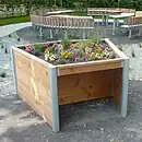 Special raised flower bed, permitting gardening in a wheelchair, in Frankfurt, Germany.