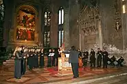 The apse, with a choir for scale.  There is normally a rope at the top of the first steps.