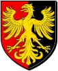 Arms of Obernai: Over a field divided vertically, red and black, a golden eagle with its wings displayed