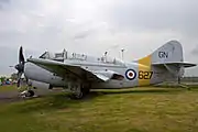 Gannet T.2; three cockpits, nose high stance, exhausts next to wing trailing edge, rounded off tailfin