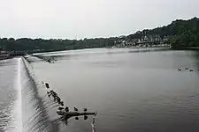 Current dam (built in 1928) and Boathouse Row in the background