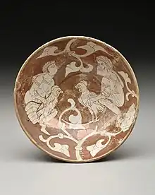 Luster Plate with Cock Fight. Cairo, 11th-12th century. Keir Collection of Islamic Art