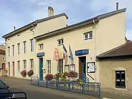 The town hall and school in Favières