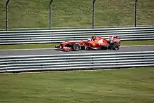 Felipe Massa driving to the pit lane