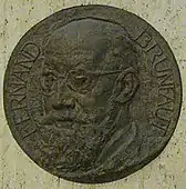 Closeup of the medallion bearing Fernand Brunfaut's image