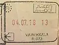 Passport exit stamp issued on the train in Vainikkala