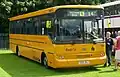 A First Student UK school bus painted in American school bus yellow