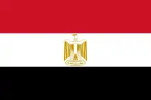 The flag of Egypt, a charged horizontal triband.