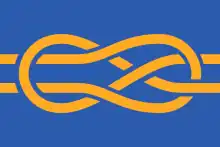 A blue flag depicting a knot tied in yellow.