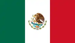 The flag of Mexico, a charged vertical triband.