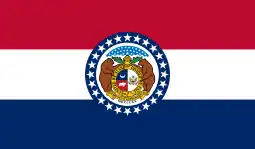 The flag of Missouri, a charged horizontal triband.