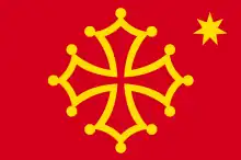 The seven-pointed star of the Felibritge on the Occitan flag.