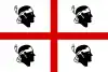 The flag of Sardinia, shows a Saint George's Cross on a white field, surrounded by four black heads, known as the Moors